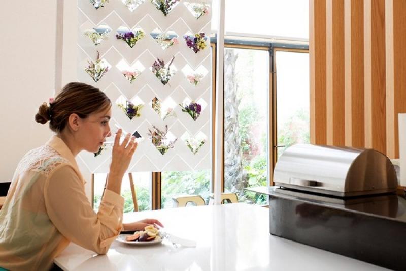 ไอเดียจัดสวนแนวตั้งกับม่านกระถางเก๋ๆ